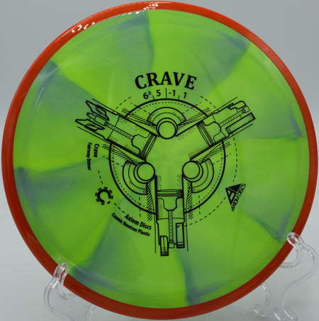 Close-up of the stamp on a Cosmic Neutron Crave resting on the tee pad at The Rez Disc Golf Course in Brandon, Mississippi