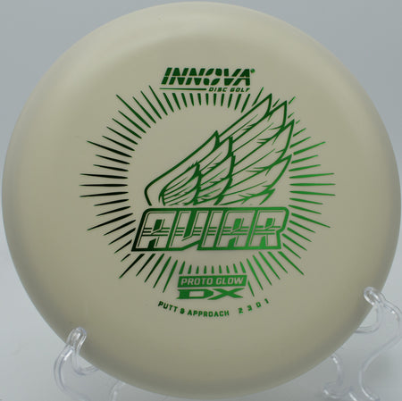 Proto Glow DX Aviar floating through the trees at Sandy Point Resort Disc Golf Course in Lac du Flambeau, Wisconsin.

