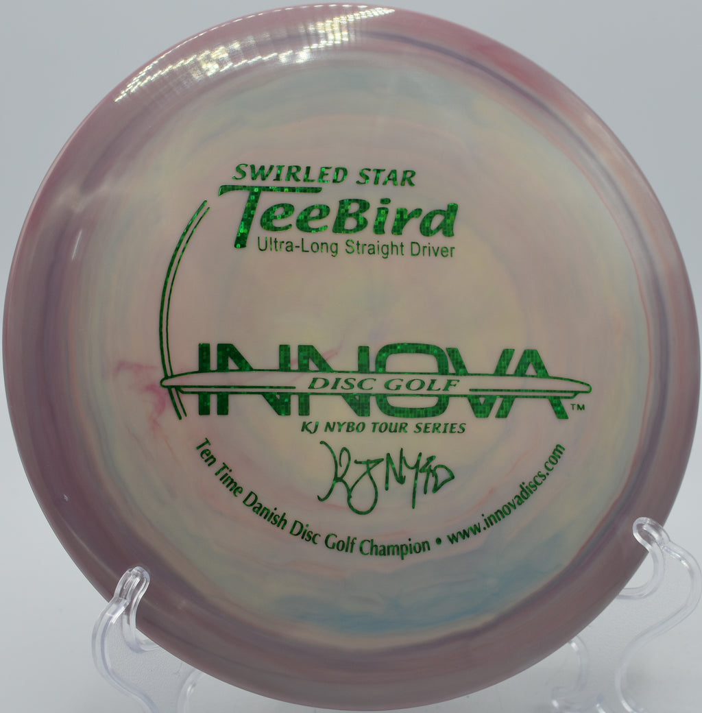 Hitting a straight line with a Swirled Star TeeBird at Blue Valley Park Disc Golf Course in Kansas City, Missouri.
