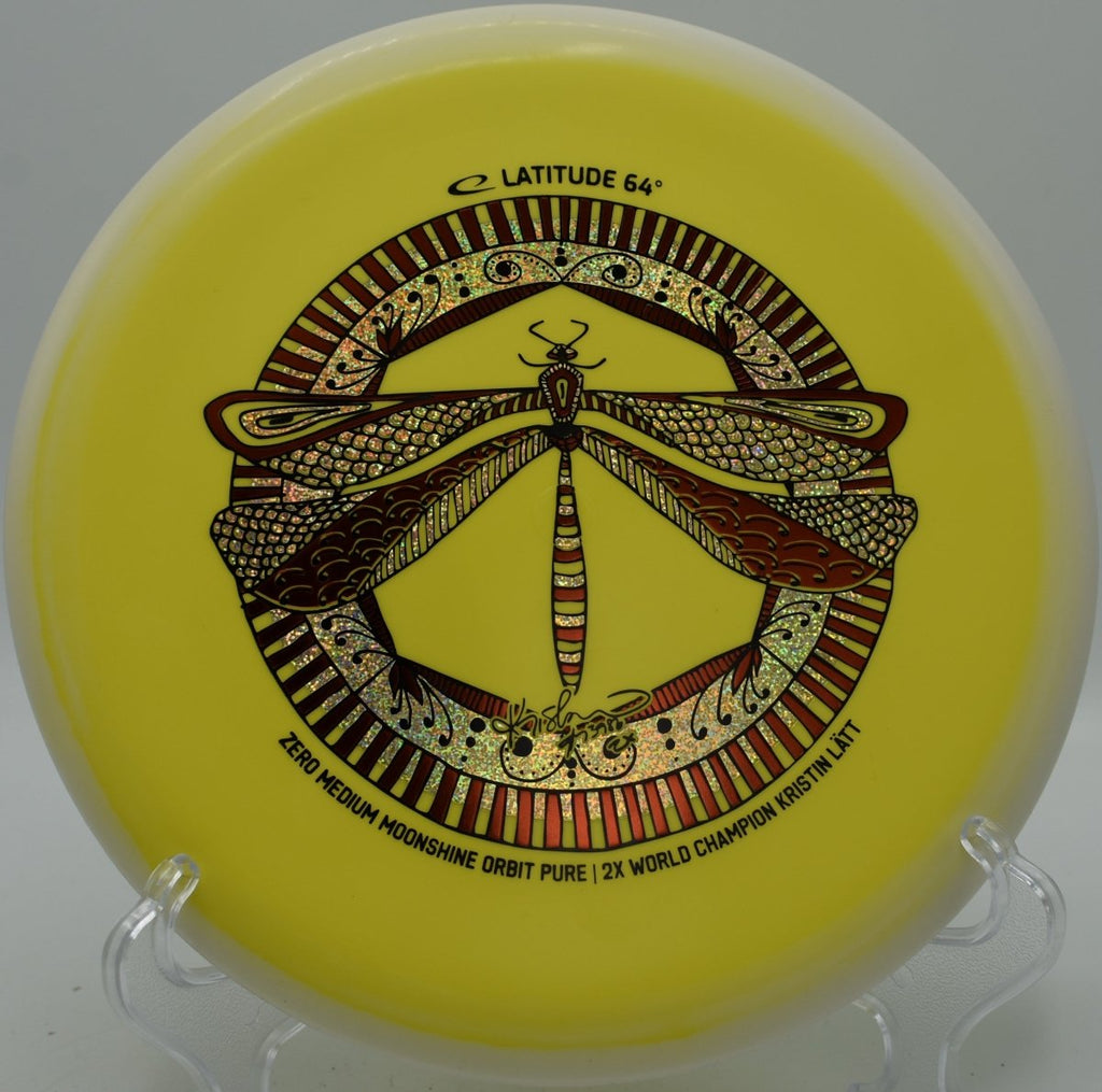 Latitude 64 Pure glow putter mid-flight toward chains at Persimmon Ridge Disc Golf Course in Greenbrier, Arkansas