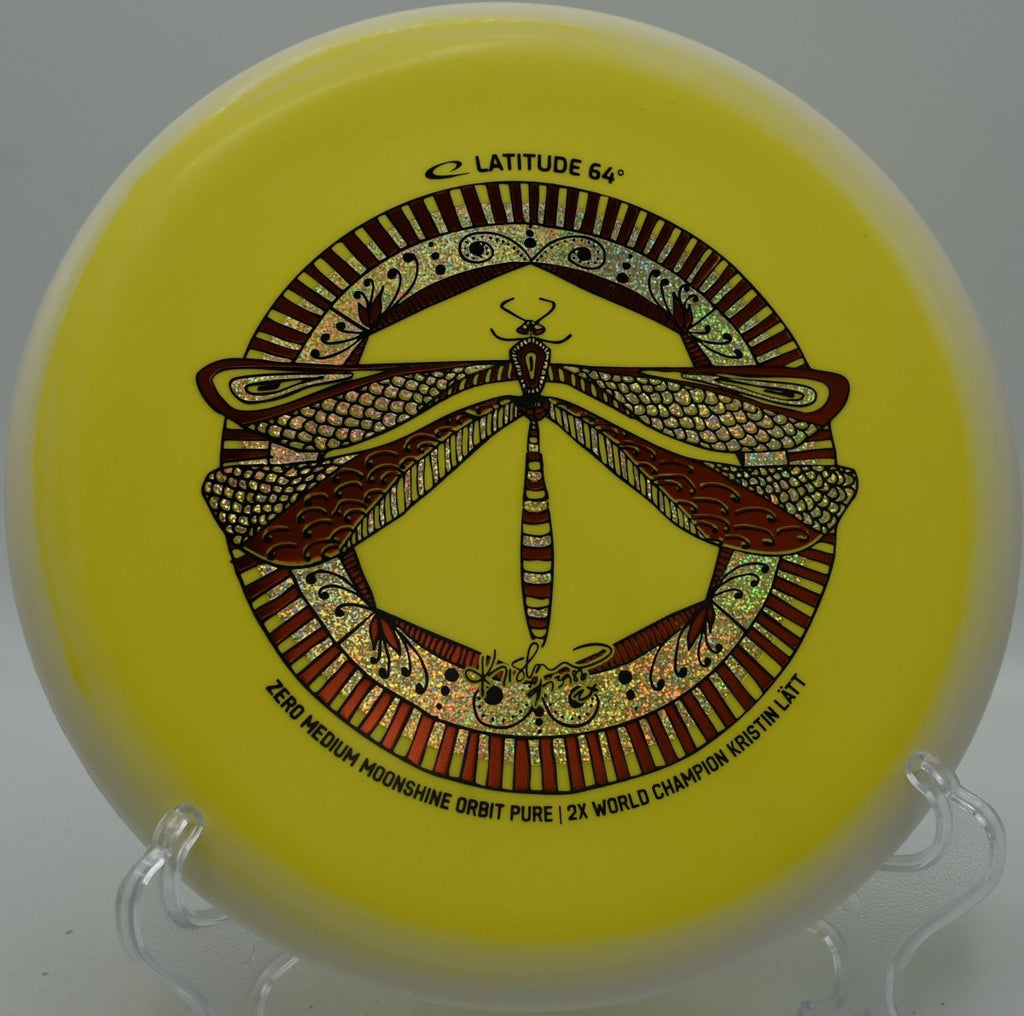 Zero Medium Moonshine Orbit Pure disc golf putter glowing on hillside green at Toboggan Disc Golf Course in Milford, Michigan