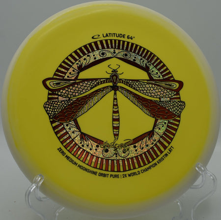 Zero Medium Moonshine Orbit Pure disc golf putter glowing on hillside green at Toboggan Disc Golf Course in Milford, Michigan