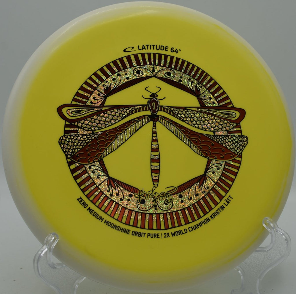 Latitude 64 Pure Orbit glow putter next to basket at Fountain Hills Disc Golf Course in Fountain Hills, Arizona desert layout
