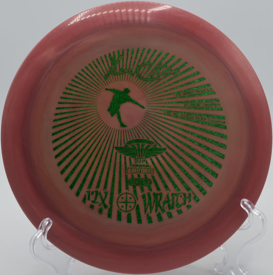 Power backhand with a Swirled Star Wraith at Rolling Pines Disc Golf Course in Wilkesboro, North Carolina.