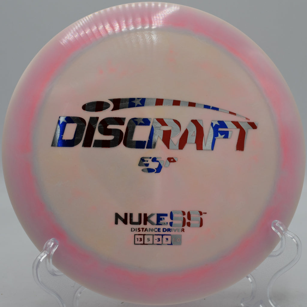 Discraft Nuke SS sailing over field at Baker Creek Preserve in Knoxville, Tennessee

