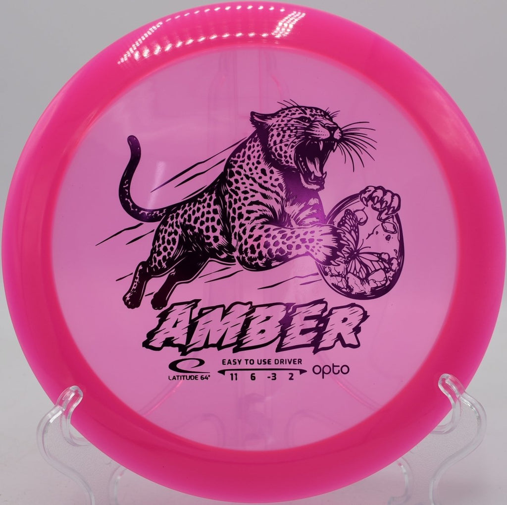 Opto Amber distance driver displayed at Milo McIver Disc Golf Course in Estacada, Oregon, built for long hyzer flips and controlled distance