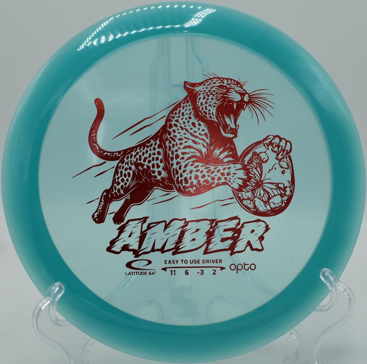 Opto Amber distance driver showcased at Harmony Bends Disc Golf Course in Columbia, Missouri, offering controlled distance and glide