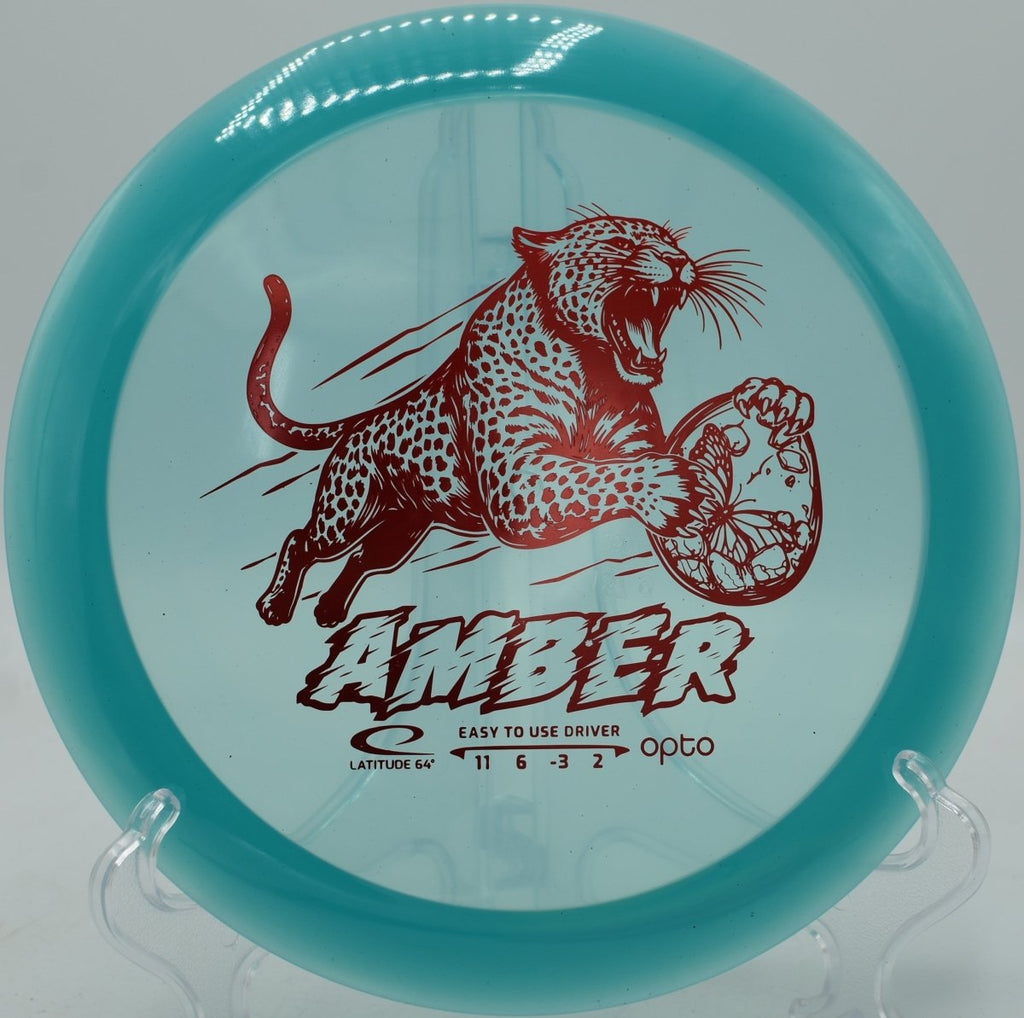 Opto Amber distance driver showcased at Harmony Bends Disc Golf Course in Columbia, Missouri, offering controlled distance and glide