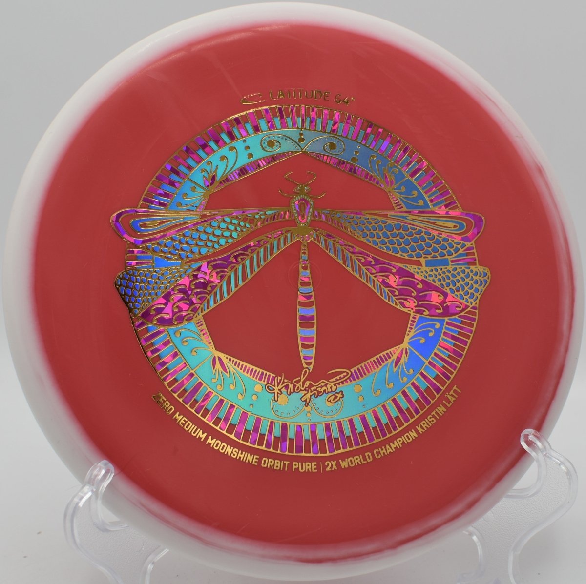 Latitude 64 Orbit Pure glow putter on rocky green at Fort Steilacoom Disc Golf Course in Lakewood, Washington