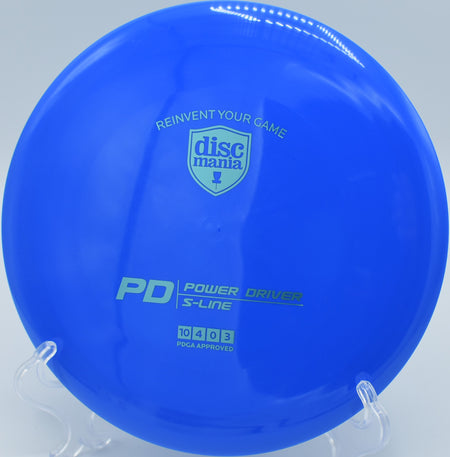 "S-Line PD disc on a tee pad at Idlewild Disc Golf Course in Burlington, KY, showcasing its precise control."
