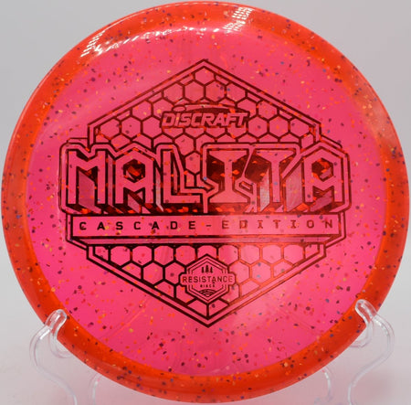 Z Confetti Malita disc golf midrange gliding toward the basket at DeLaveaga Disc Golf Course, Santa Cruz, California