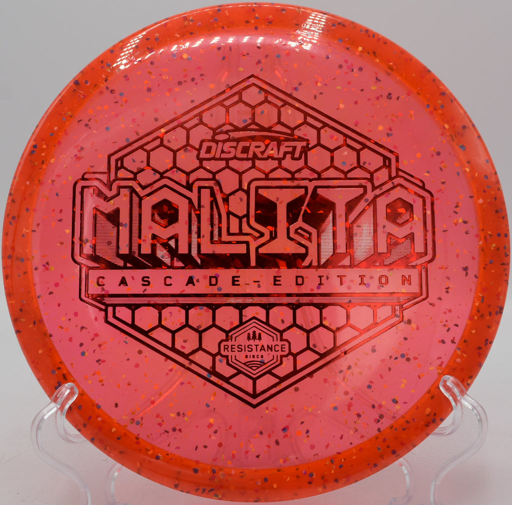 Z Confetti Malita disc golf midrange flying a controlled turnover at Blue Ribbon Pines, East Bethel, Minnesota