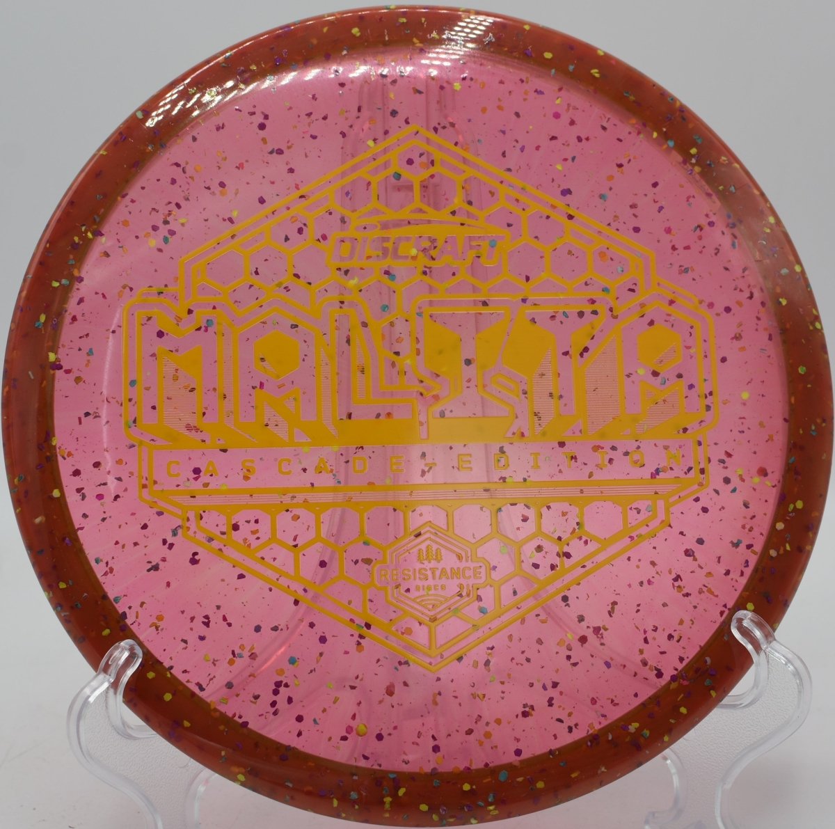 Z Confetti Malita disc golf midrange holding a gentle anhyzer at Persimmon Ridge Disc Golf Course, Greenbrier, Arkansas
