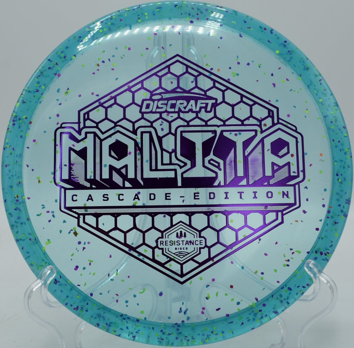 Z Confetti Malita disc golf midrange shaping a finesse line at Toboggan Disc Golf Course, Milford, Michigan