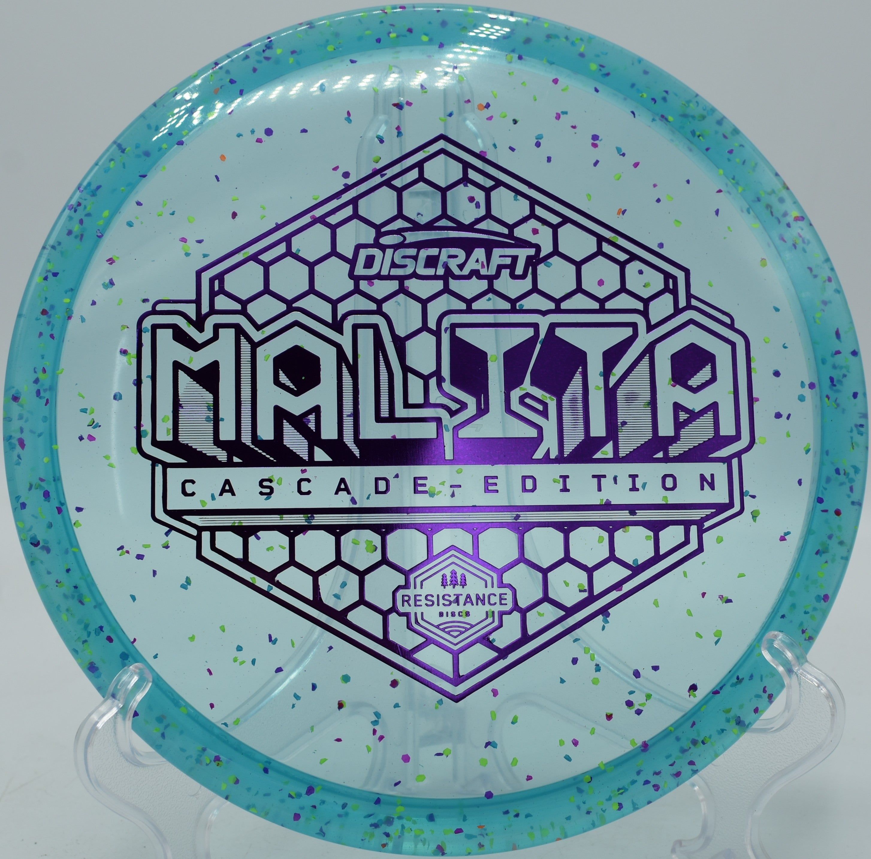 Z Confetti Malita disc golf midrange carrying a turnover approach at Hidden Ridge Disc Golf Course, West Milford, New Jersey