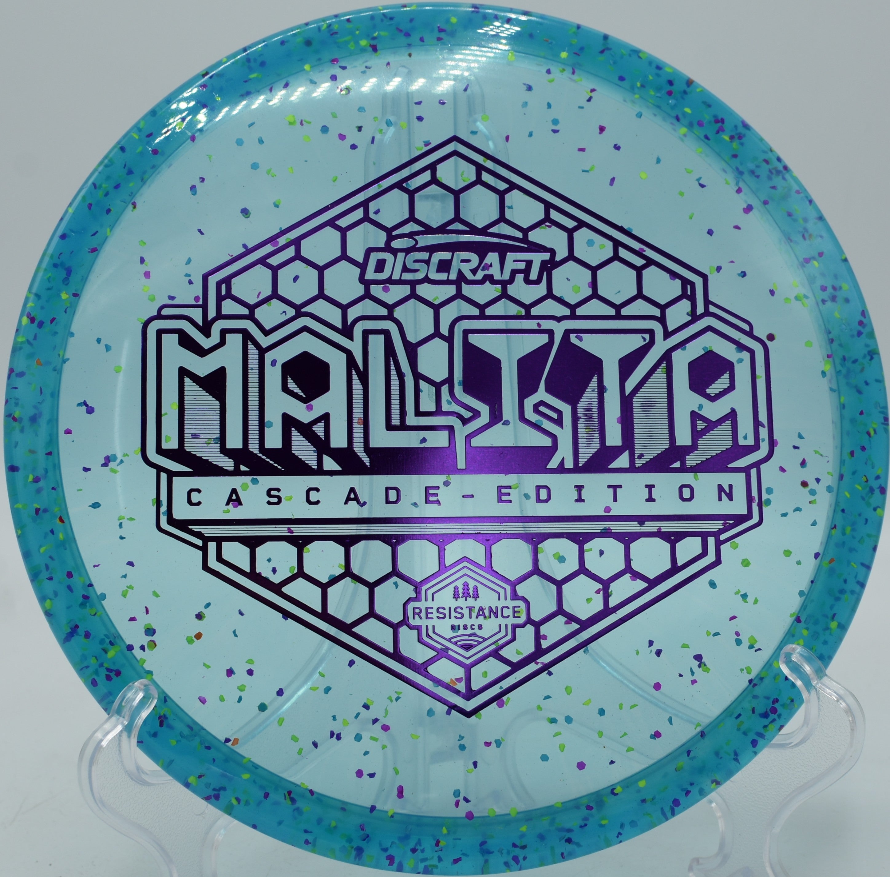 Z Confetti Malita disc golf midrange gliding through a forest fairway at Kayak Point Disc Golf Resort, Stanwood, Washington
