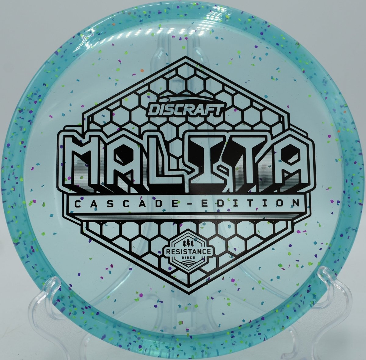 Z Confetti Malita disc golf midrange attacking a wooded green at Iron Hill Disc Golf Course, Newark, Delaware