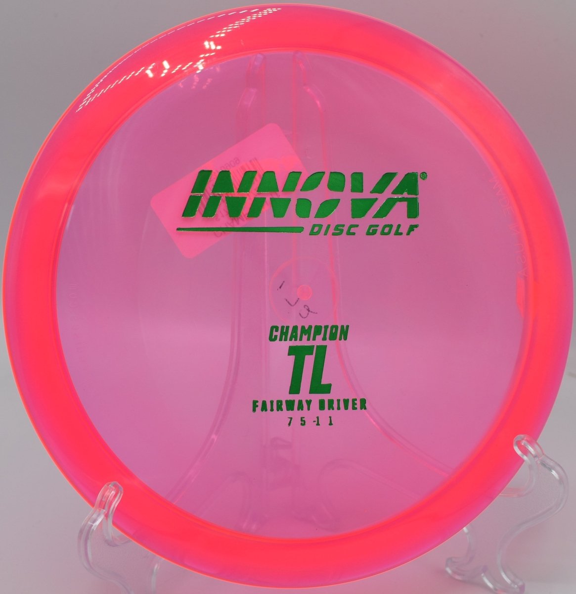 Champion TL fairway driver driving a glidey straight shot at Lakewood Park Disc Golf Course in Fort Pierce, Florida