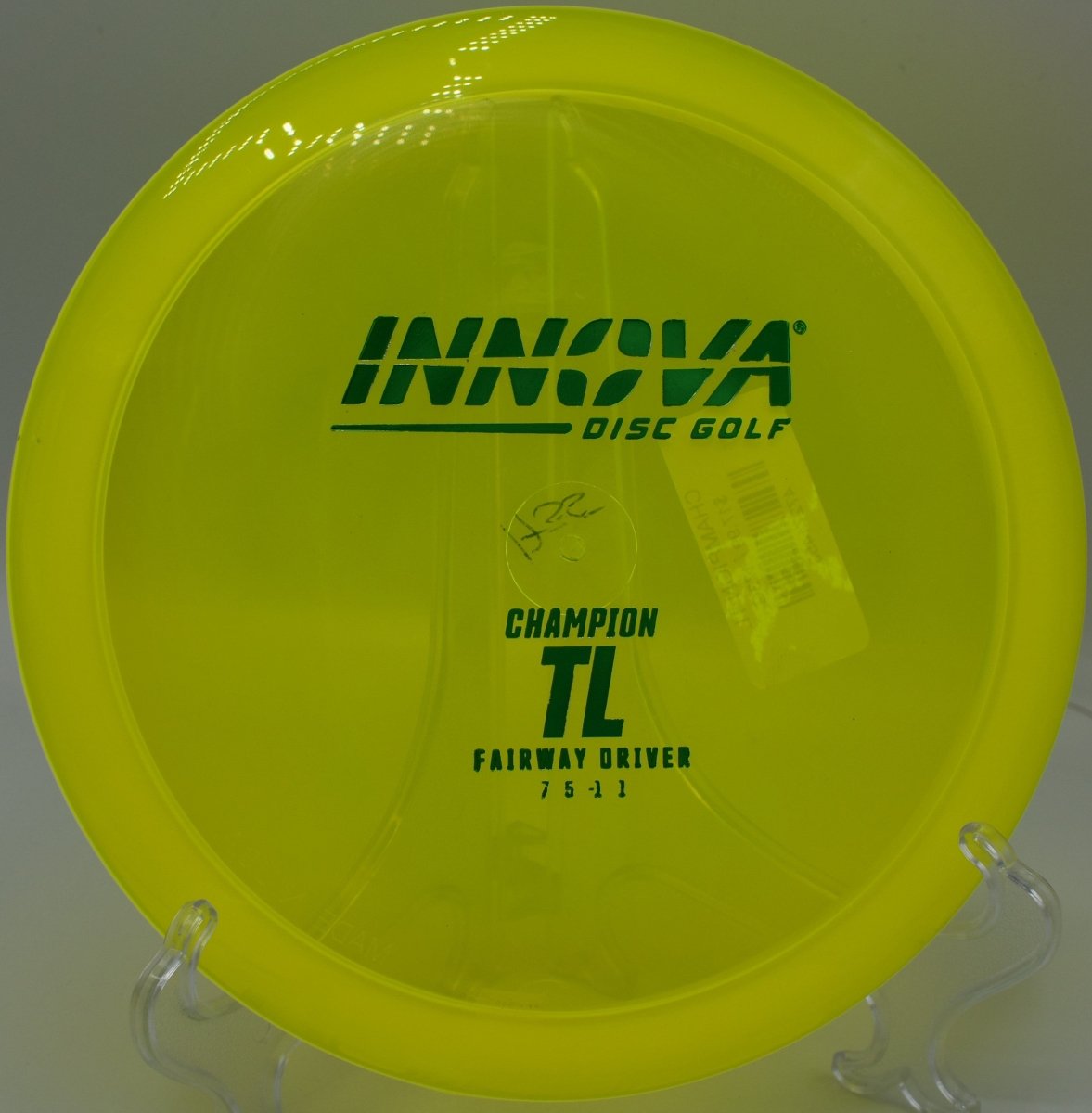 Innova Champion TL driver shaping a controlled turnover line at Cedar Hills Disc Golf Course in Raleigh, North Carolina