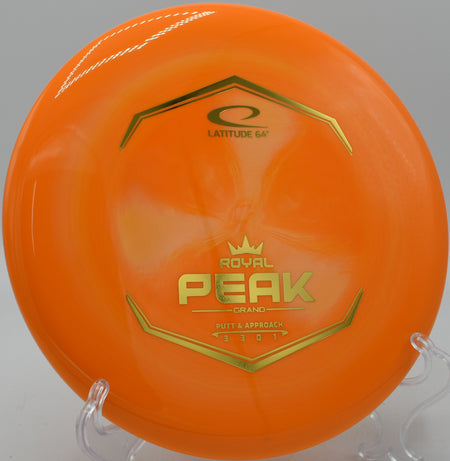 Close-up of Grand Peak’s stamp glowing in late afternoon sun at Red Fox Disc Golf Course in Waco, Texas.

