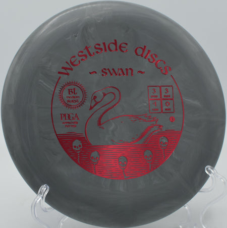 Westside Discs BT Burst Medium Swan floating through a narrow tunnel shot at The Hill at Disc Golf Heaven in Indiana.

