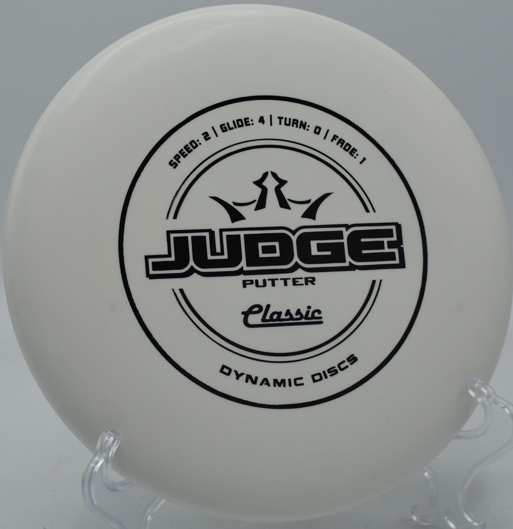 Classic Judge gliding on a flat line through the woods at Bear Cave Disc Golf Course in Buchanan, Michigan.

