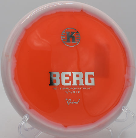 Player unleashing a K1 Grind Alva into a headwind at Zephyrhills Disc Golf Course in Florida.

