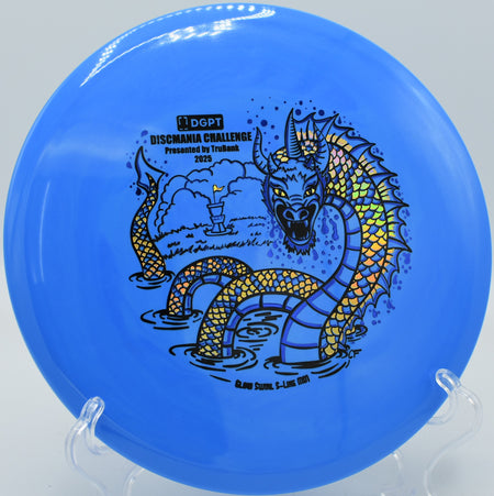 Swirly Glow MD1 glowing mid-flight during a night round at Zephyrhills Disc Golf Course in Florida.

