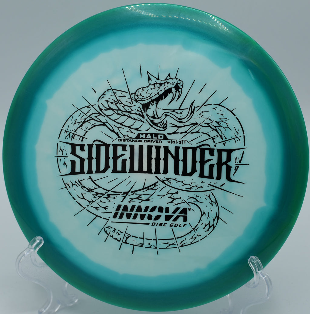 An Innova Halo Star Sidewinder soaring through the desert air at Paseo Vista Disc Golf Course in Chandler, Arizona.