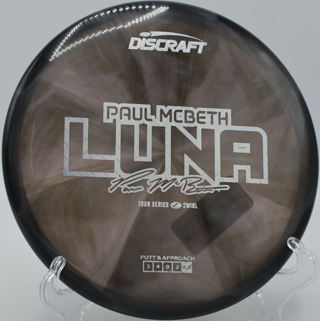 Close-up of a swirled Z Luna before release at Harmon Hills Disc Golf Course in Fall Branch, Tennessee.

