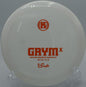 "Shop the Grym-X driver for reliable fade and distance in Seattle, WA’s disc golf scene."
