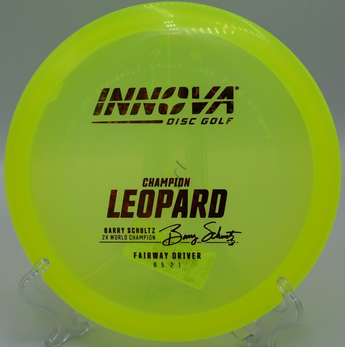 Champion Leopard fairway driver driving a glidey straight shot at Lakewood Park Disc Golf Course in Fort Pierce, Florida