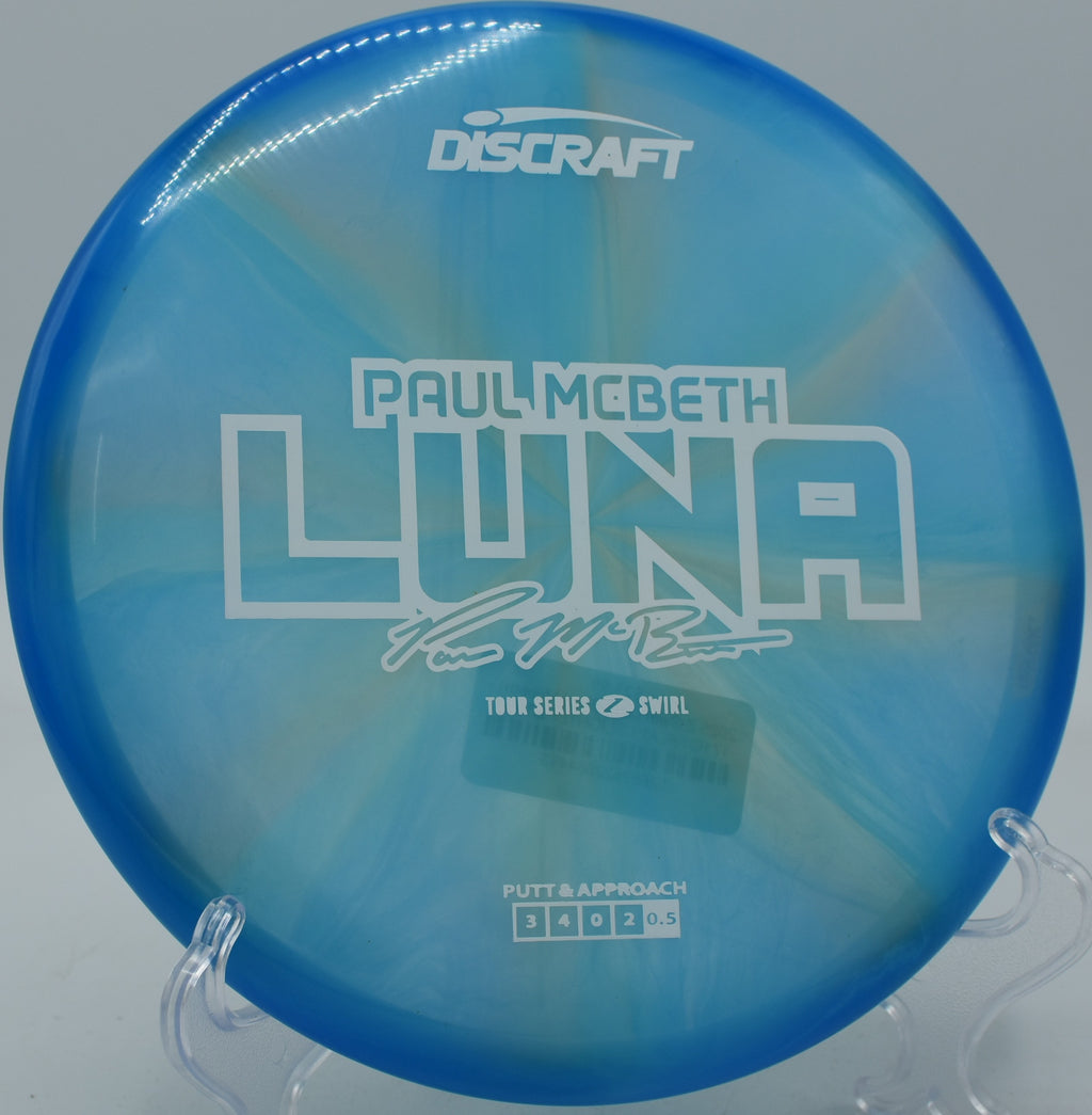 Luna gently fading left during a circle 2 putt at Rock Ridge Disc Golf Course in Pittsboro, North Carolina.

