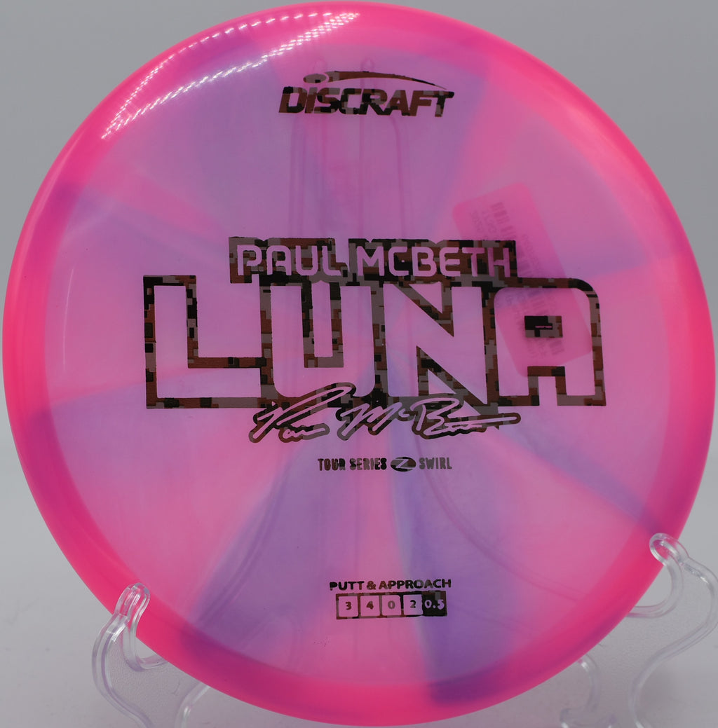 Z Swirl Luna hugging the right line on a downhill throw at The Hill at Disc Golf Heaven in Indiana.

