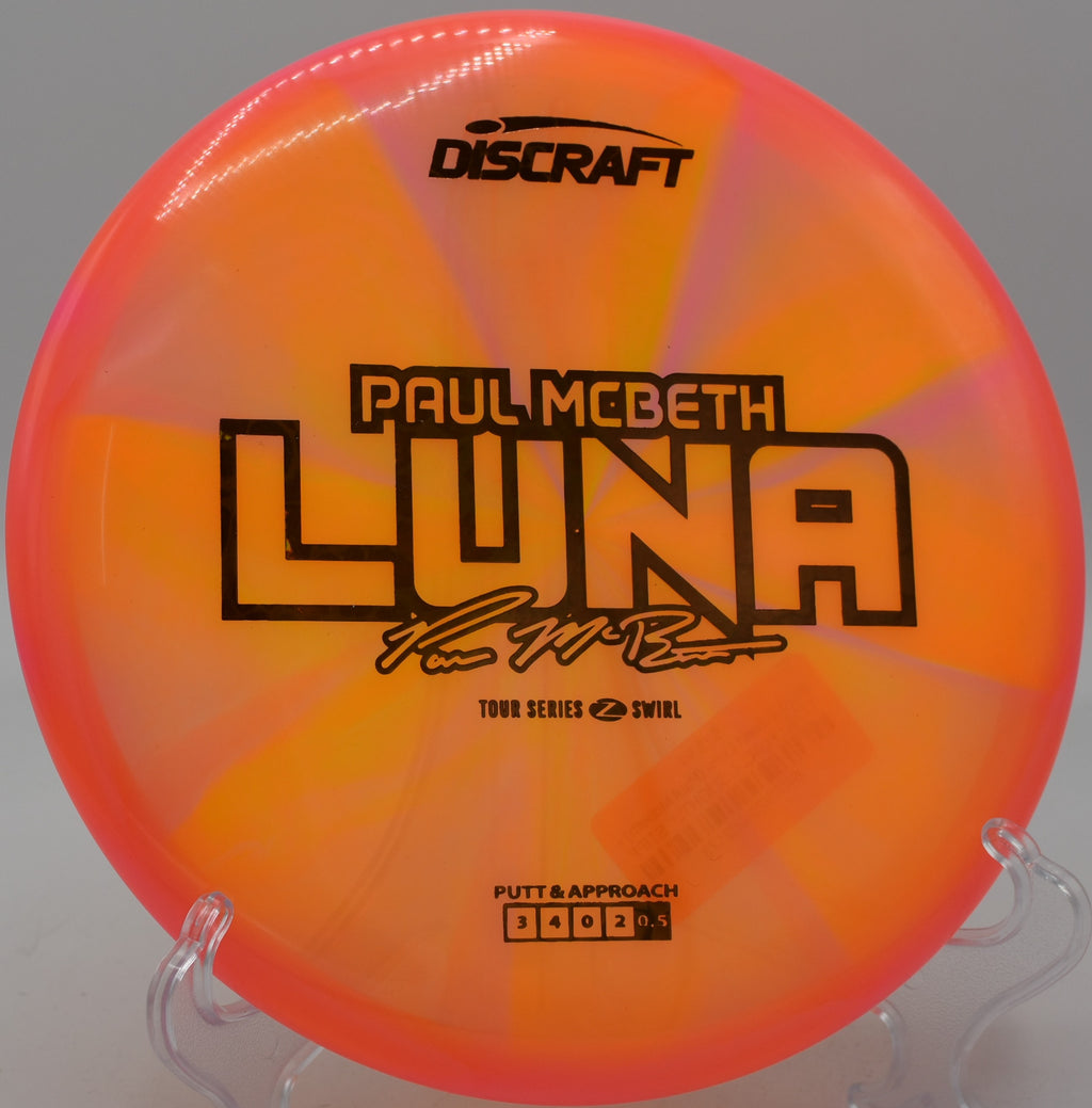 Discraft Luna used on a short approach shot at Whispering Pines DGC in Greer, South Carolina.

