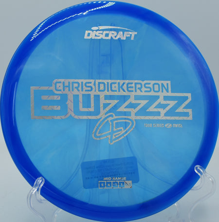 Player throwing a swirled Z Buzzz on a laser-straight line at Panther Creek in Springfield, Illinois.


