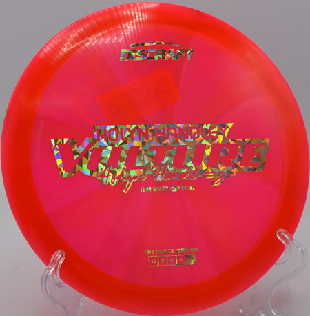 Discraft Vulture in Z Swirl plastic carving a flex shot at Harmony Bends in Columbia, Missouri.

