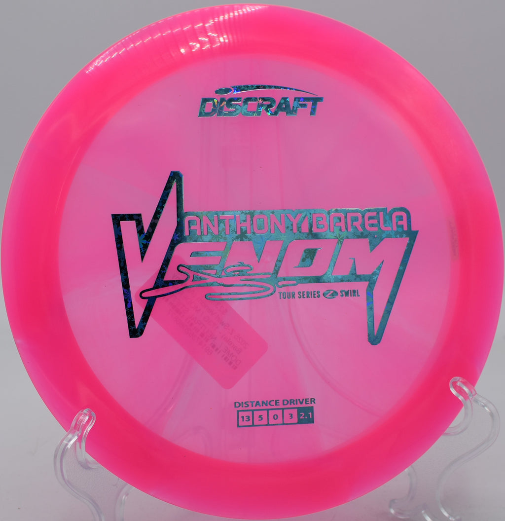 Discraft Z Swirl Venom skipping hard off the fairway at Swope Park in Kansas City, Missouri.

