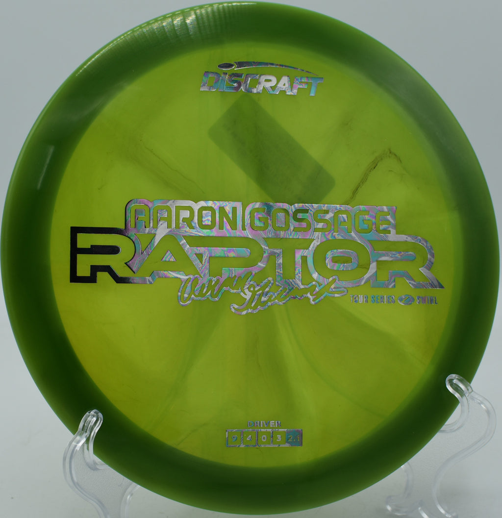 Z Swirl Raptor carving through a tight wooded gap at Zephyrhills Disc Golf Course in Florida.

