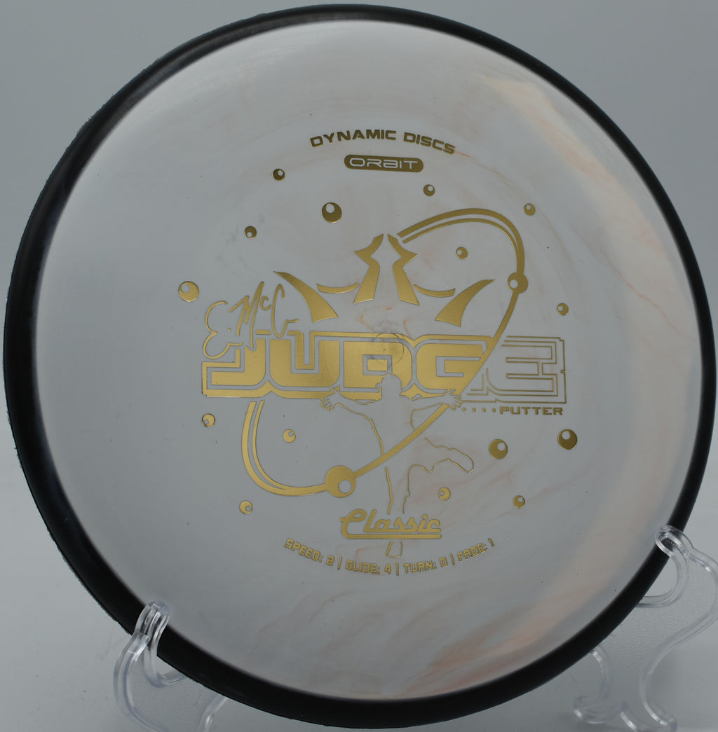 Two-tone Orbit Judge flying straight at Glenwood Springs Disc Golf Course in Glenwood Springs, Colorado

