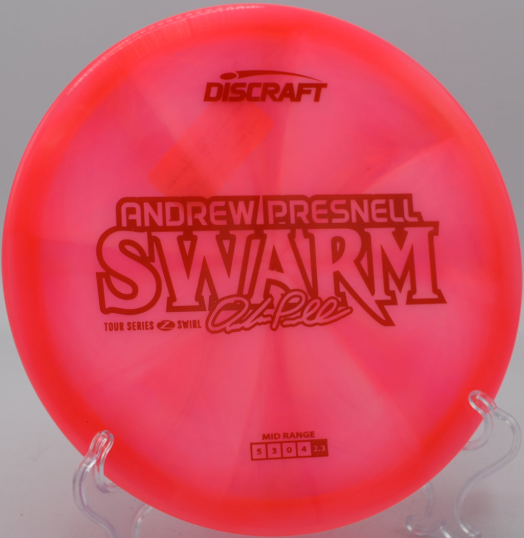 Discraft Z Swirl Swarm holding a strong hyzer line into a headwind at Maple Hill Disc Golf Course in Leicester, Massachusetts.


