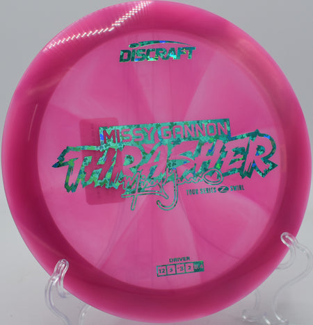 Discraft Thrasher in Z Swirl plastic caught mid-flight at Panther Creek DGC in Springfield, Illinois.

