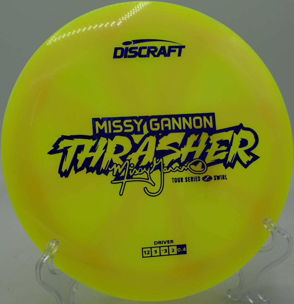 Discraft Z Swirl Thrasher riding a turnover line toward the green at Flip City in Shelby, Michigan.

