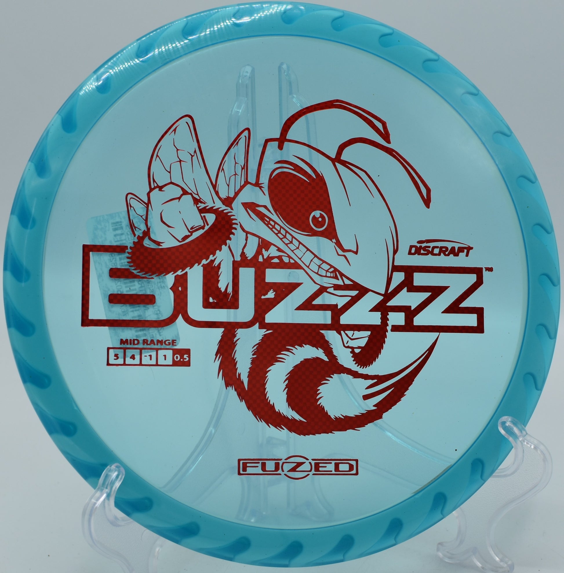 "Fuzed Buzzzsaw midrange by Discraft, delivering precision and torque resistance, now shipping to Tampa, FL."
