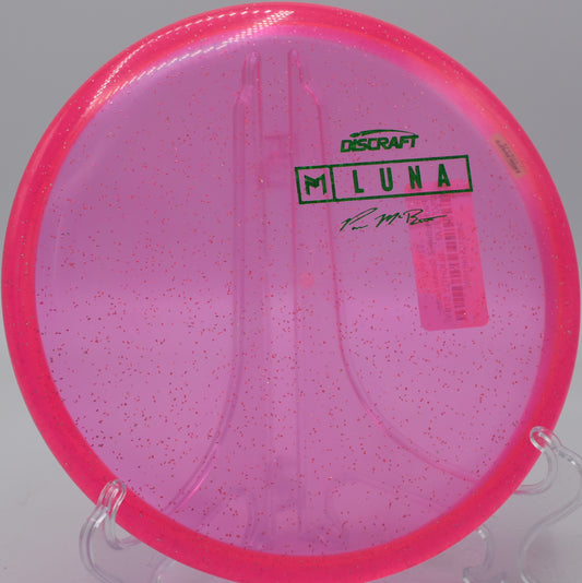 Player executing a low hyzer with the Z Sparkle Luna at Trophy Club Park in Texas.

