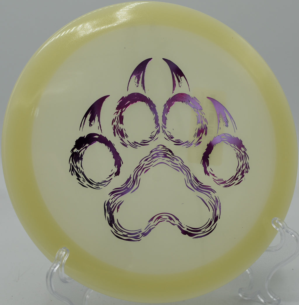 Close-up of the Nocturnal Alpha’s rim and stamp on a lit-up tee pad at Trophy Lakes in Johns Island, South Carolina

