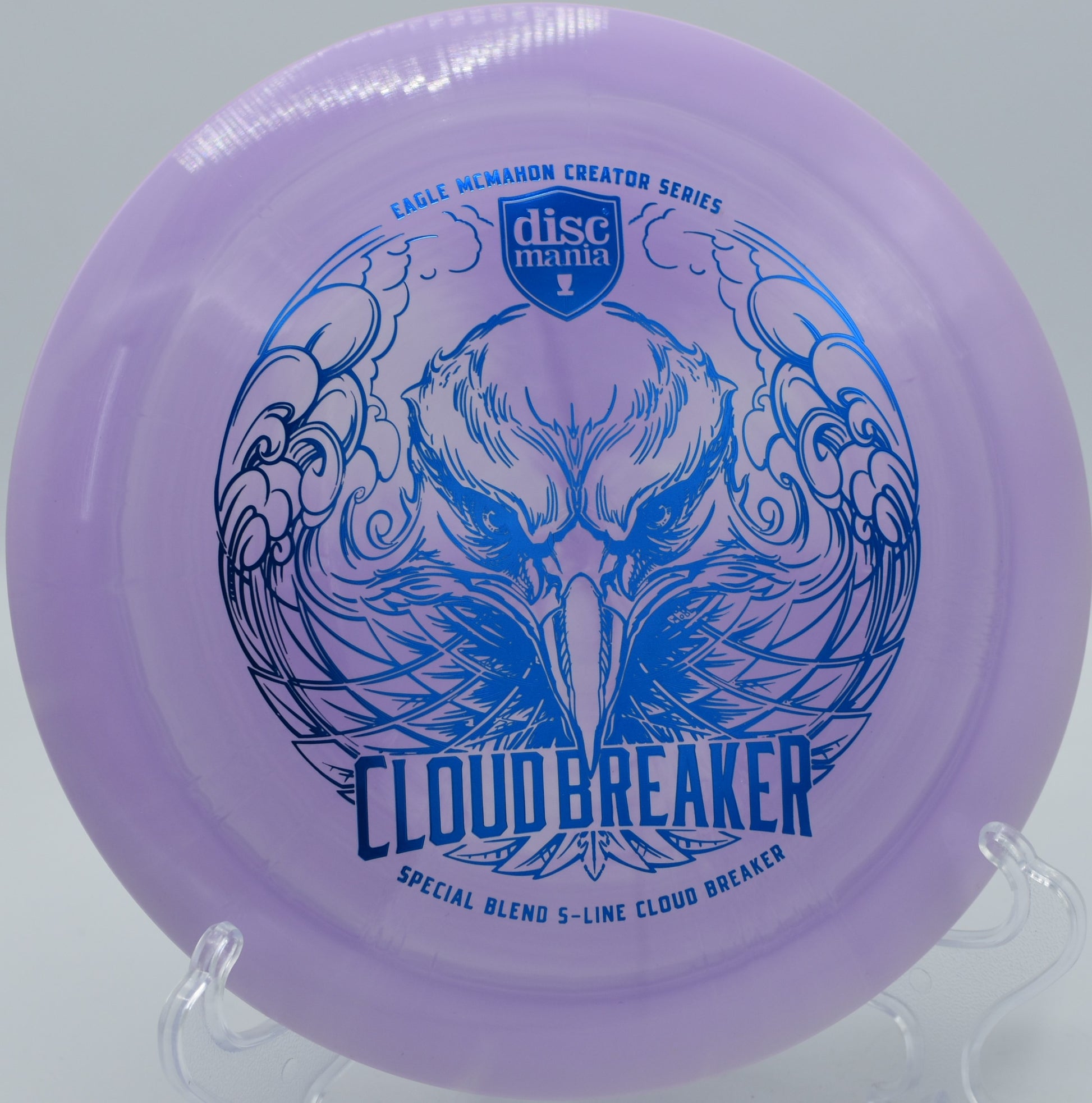 "Shop the Cloud Breaker by Discmania, Eagle McMahon’s signature distance driver, perfect for long S-curve flights, shipping to Kansas City, MO."
