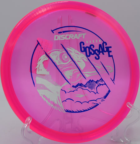 Discraft CryZtal Buzzz OS flashing mid-flight on a stable forehand line at Idlewild Disc Golf Course in Burlington, Kentucky.

