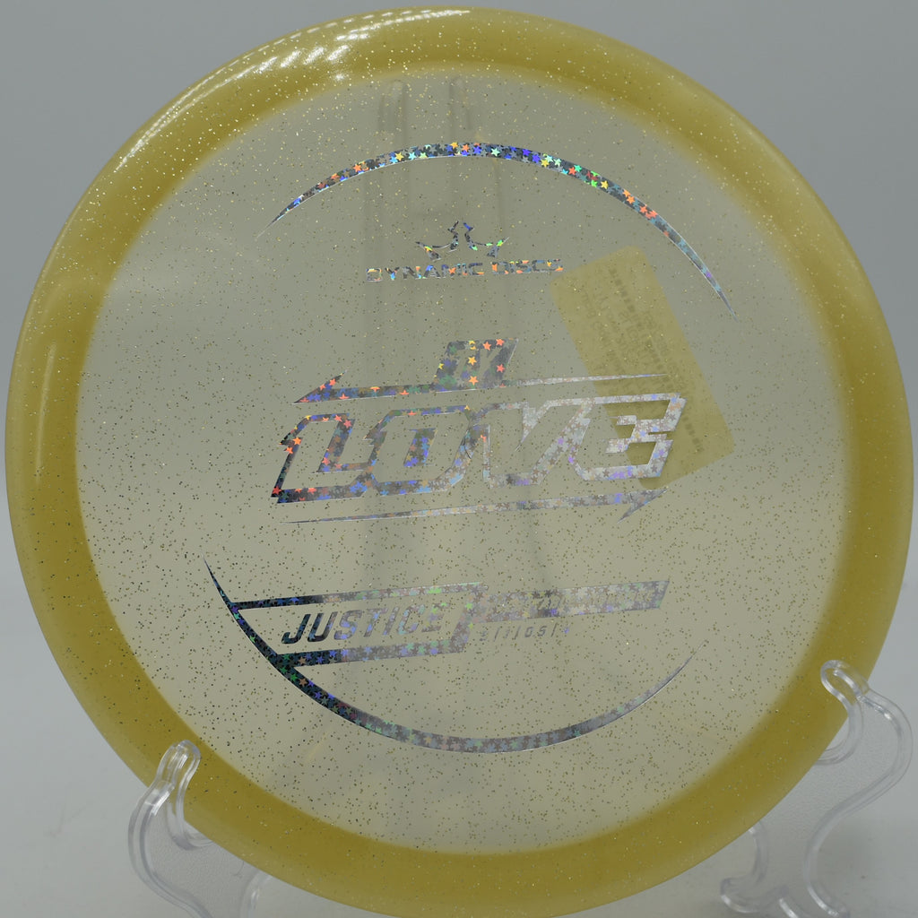 Lucid Gold Metal Flake Justice skipping hard on a forehand upshot at Panther Creek DGC in Springfield, Illinois.

