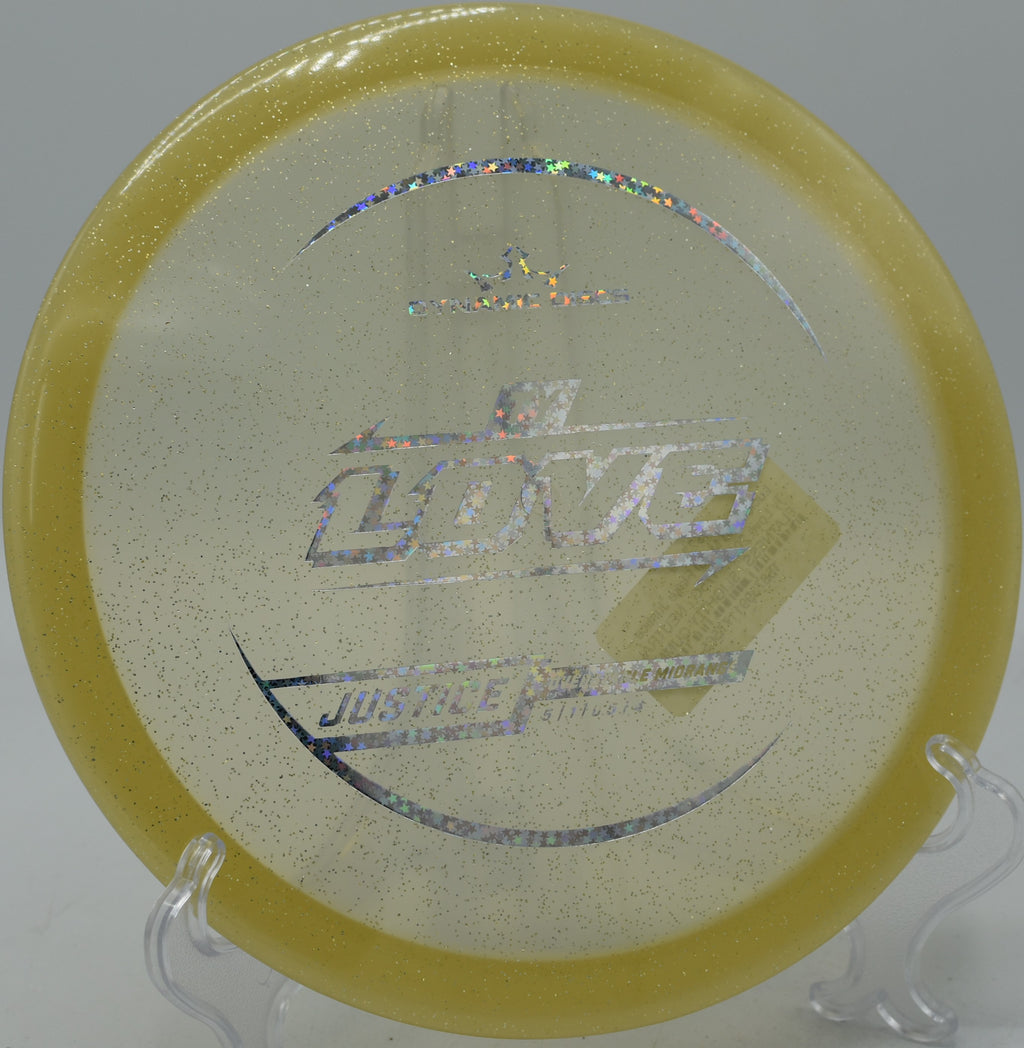 Ty Love’s Lucid Gold Justice fading sharply into the green at Maple Hill Disc Golf Course in Leicester, Massachusetts.

